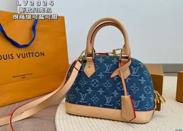 Lv blue denim shell bag.