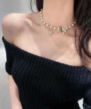 X585  Bow pearl necklace