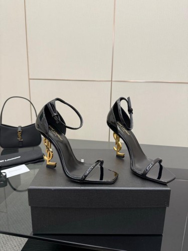 Sandali YSL in vernice nera e tacco dorato 