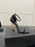 Sandali YSL in vernice nera e tacco dorato 