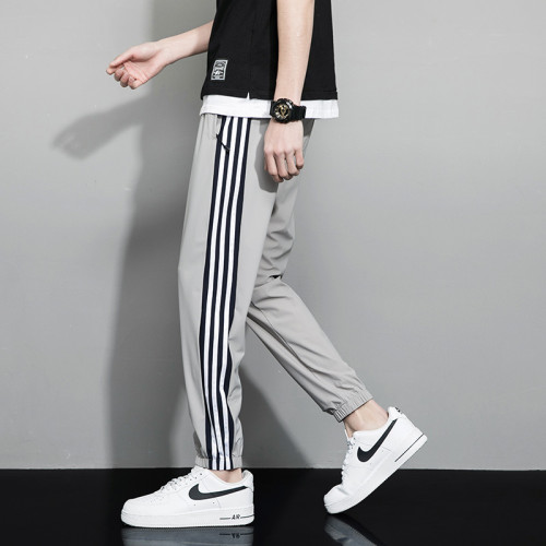 Summer new men's large size ice silk loose casual ultra-thin pants breathable antibacterial fashion all-match trousers