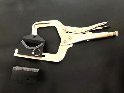 Handheld Fret Press with 2 neck support cauls  - No inserts are included.