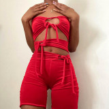 Stitching solid color sleeveless backless lace-up slim-fit shorts jumpsuit M21RP193