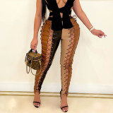 Sexy hollow women's trousers, zipper, perforated stitching and PU leather pants, winter new style