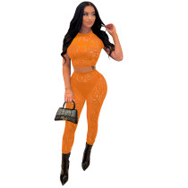 Hole solid color tight sexy sports and leisure two-piece suit