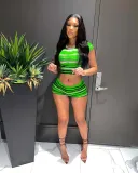 Two-piece set of fashionable short printed top with waist and shorts