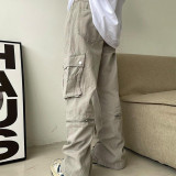 Utility multi-pocket low-rise zipper slit denim slacks