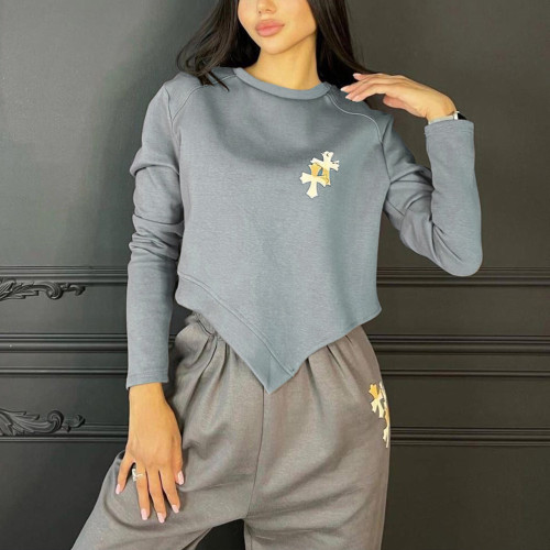 Fashion women's autumn and winter new round neck cross print long sleeve bevel sports sweater