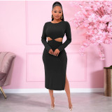 Solid color long-sleeved slit bandage pit-striped fabric sexy hip-lifting hollow seven-point skirt