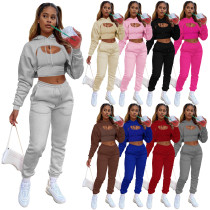 three-piece fleece drawstring hoodie with cotton tank top and jogger pants