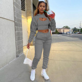 three-piece fleece drawstring hoodie with cotton tank top and jogger pants