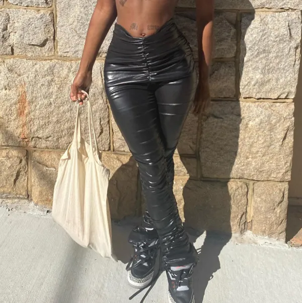 Fashion low waist slim sexy ruffled hip leather casual pants