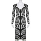 Black and white contrast V-neck long sleeve tight hip wrap wool one-piece dress