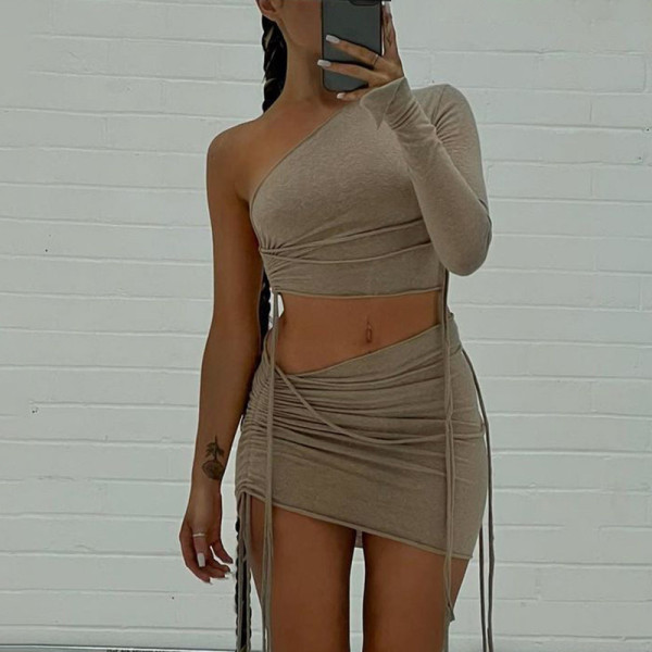 One shoulder open navel top slim side drawstring skirt suit