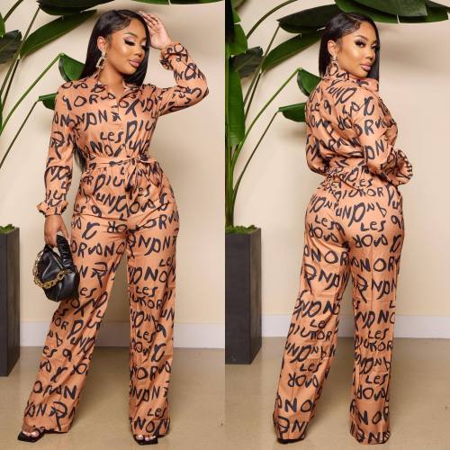 Single breasted lapel lettered banded waist jumpsuit