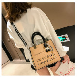 Matte women's bag, doll decoration, women's handbag, large capacity messenger bag