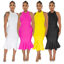 Solid color hanging neck dress with buttocks and fishtail skirt