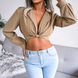 Suit neck knotted shirt with navel exposed