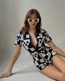 Sexy plaid short sleeved lapel tight jumpsuit temperament Spicy girl knitted jumpsuit shorts