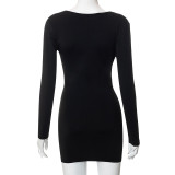 Open back long sleeved front and back wearing a short dress