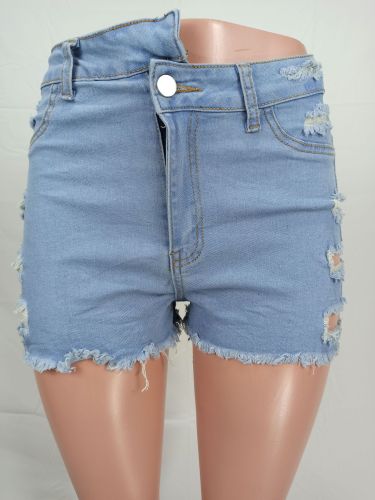 Fashionable perforated irregular denim shorts