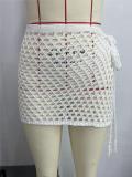 Women's sexy knitted texture hollowed out holiday perspective one piece short beach skirt