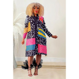 Women's printed long sleeved button up mid length dress