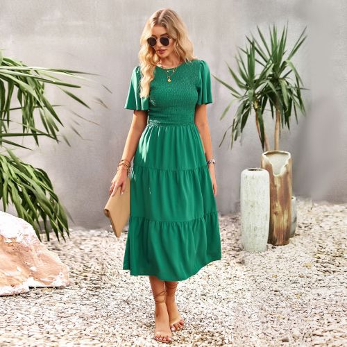 Large swing dress with round neck and holiday skirt