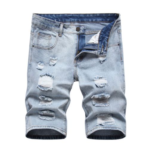 Perforated men's denim pants with many tattered jeans