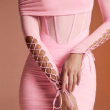 Mesh stitching and fashionable temperament with straps, pleated waist and buttocks skirt