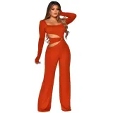 Women's sexy waist revealing slim fitting long sleeved jumpsuit