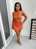 Knitted hollowed out vest and skirt two-piece set