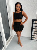 Knitted hollowed out vest and skirt two-piece set