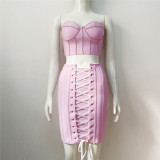 Wearing a strapless diamond studded top with drawstring bandages for a 2-piece dress set