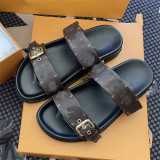 Outgoing flat bottomed metal buckle double strap letter sandals