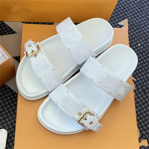 Outgoing flat bottomed metal buckle double strap letter sandals