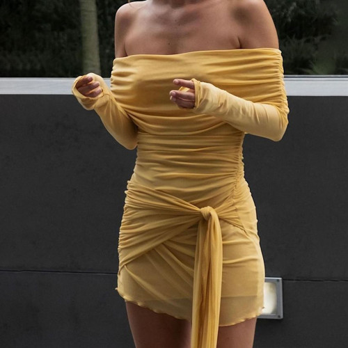 Skirt with strapless design, long sleeved, pleated, and hip hugging skirt