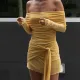 Skirt with strapless design, long sleeved, pleated, and hip hugging skirt