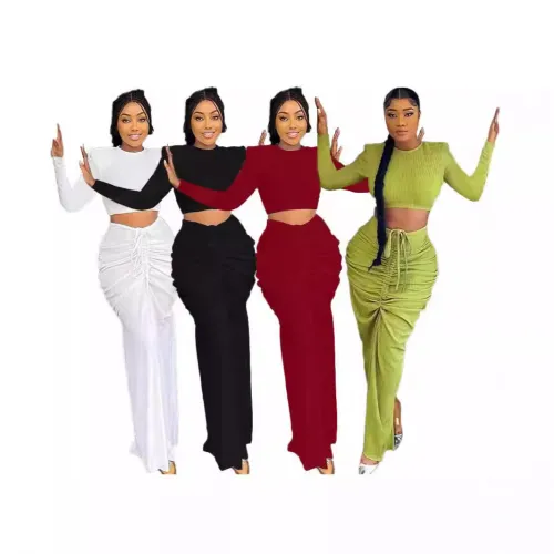 Women's long sleeved pleated waist revealing long skirt set