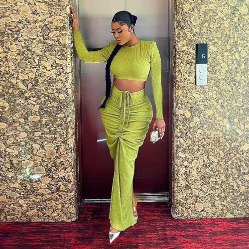 Women's long sleeved pleated waist revealing long skirt set