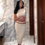 Two piece set of sleeveless top with ribbon skirt