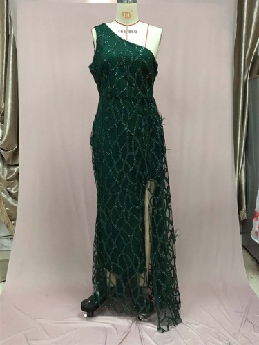 Sequined long sleeveless mid length evening gown