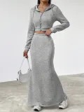 Long sleeved hooded zipper sweatshirt with hip hugging long skirt set