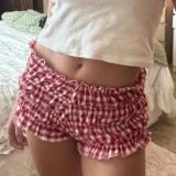 Folded zip shorts with elastic waistband, contrasting color plaid low waisted hot pants
