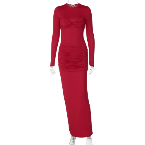 Round neck long sleeved dress with pleats, wrapped buttocks, solid color long skirt