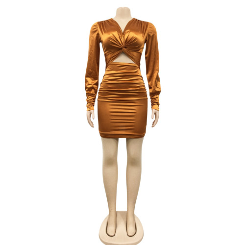 Solid color long sleeved hollow pleated mid skirt dress