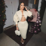 Two piece set of cardigan, sweater, hip hugging skirt