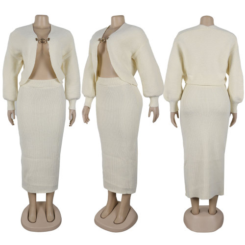 Two piece set of cardigan, sweater, hip hugging skirt
