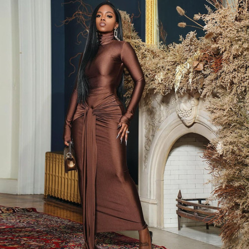 Round neck long sleeved dress with mid waist tie and ribbon skirt