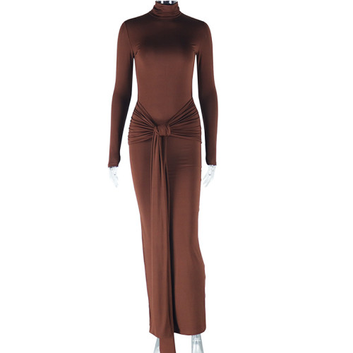 Round neck long sleeved dress with mid waist tie and ribbon skirt